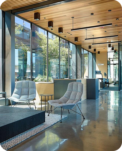Modern commercial lobby with floor-to-ceiling windows